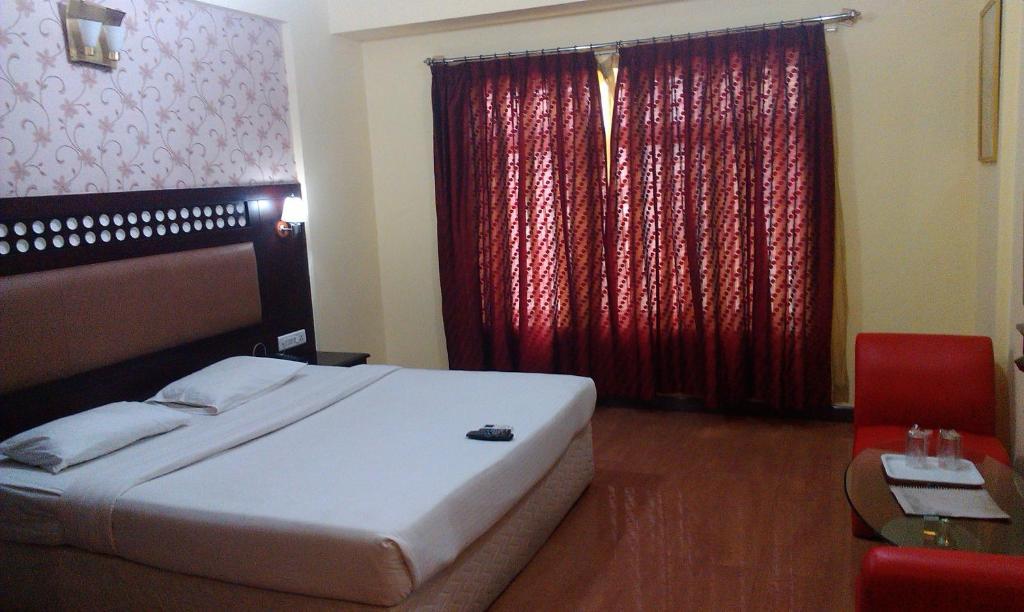Solitaire Suites Bangalore Rum bild